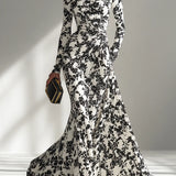 Nikita | Black & White Floral High-Neck Maxi Dress