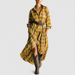 Abril yellow check shirt dress on a neutral grey background