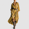 Abril yellow check shirt dress on a neutral grey background