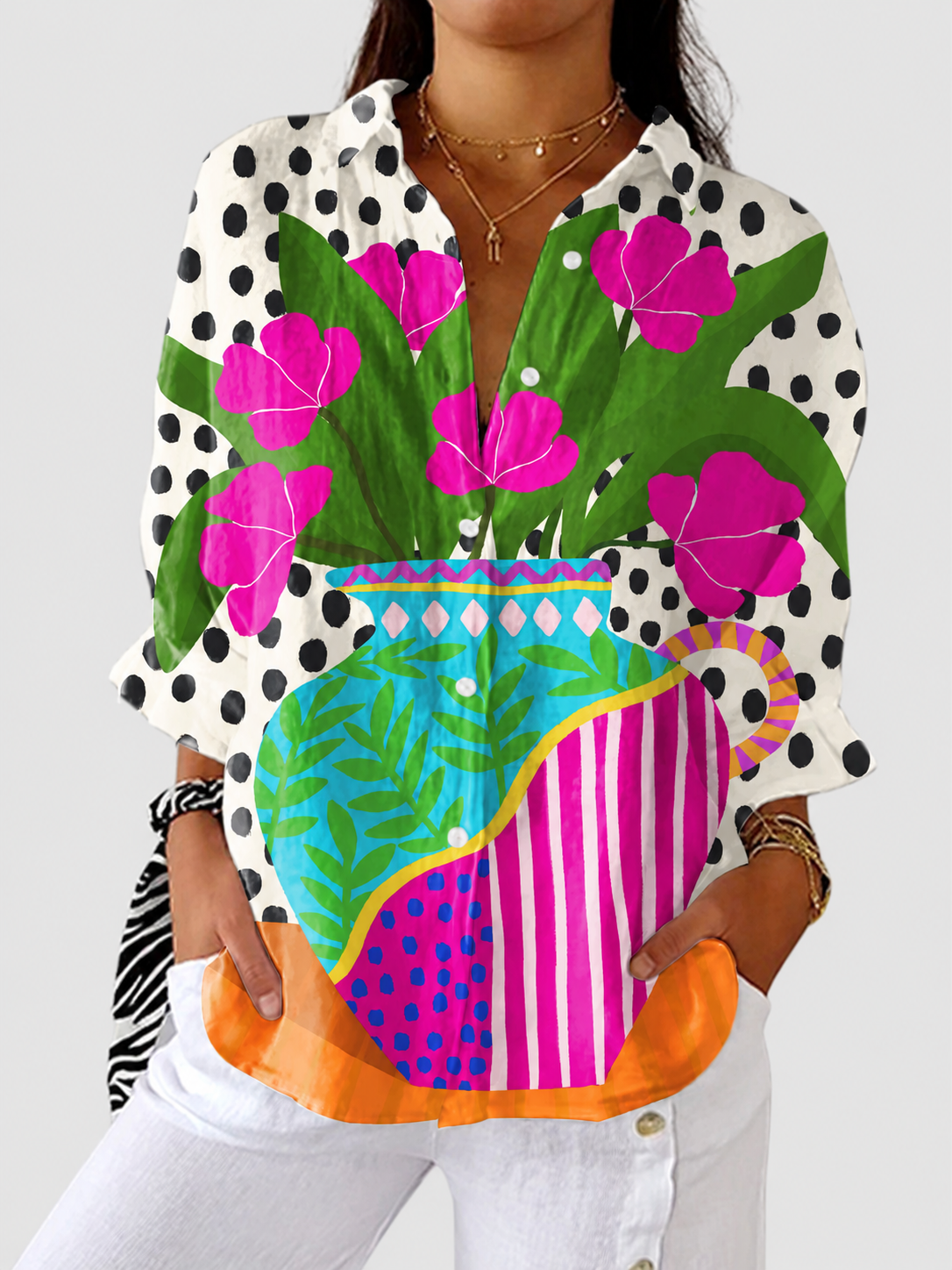 Amara floral vase print blouse on a neutral grey background