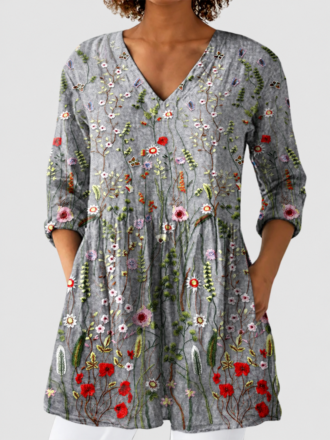 Amelie grey floral print blouse on a neutral grey background