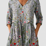 Amelie grey floral print blouse on a neutral grey background