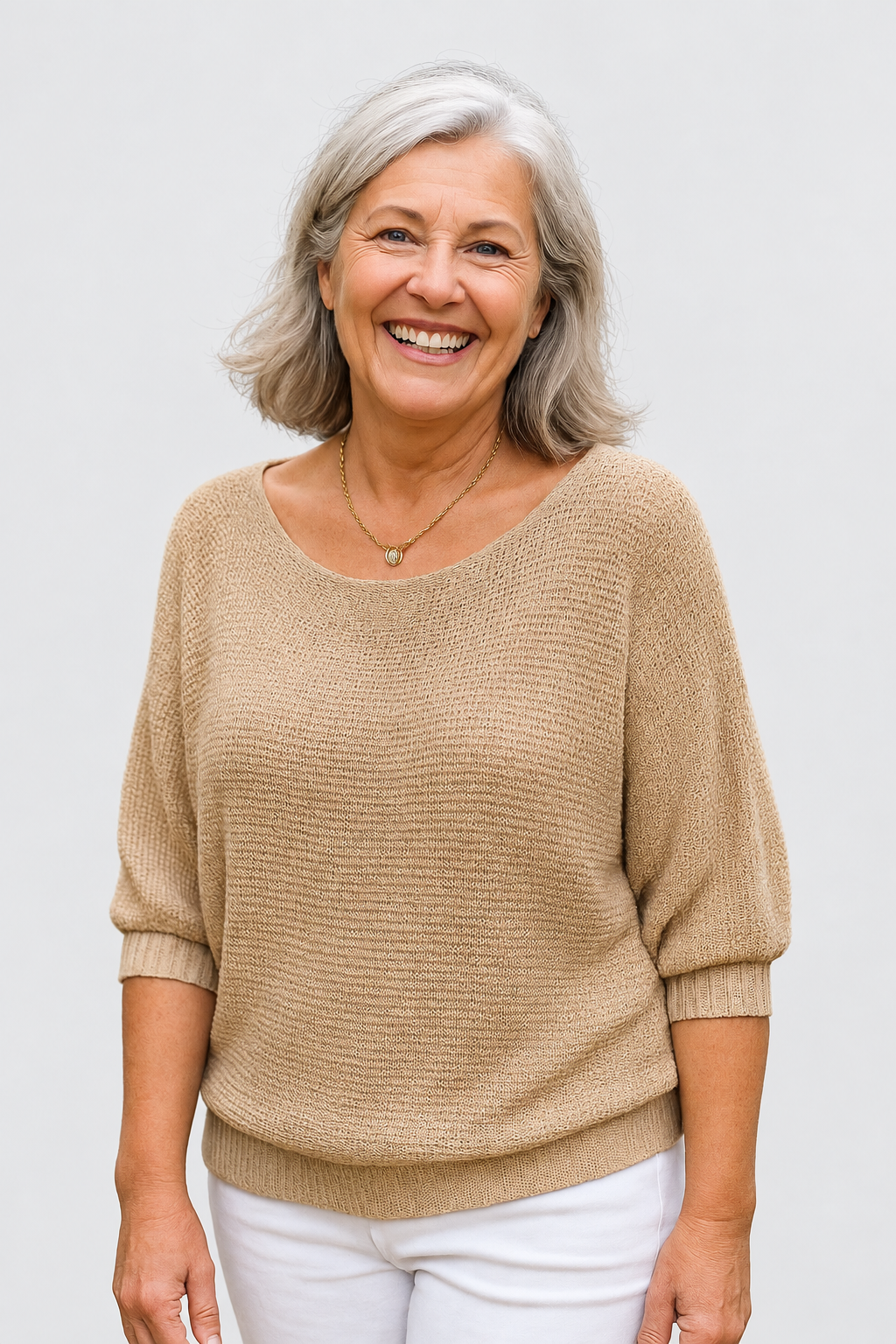 Anetta | Soft Knit Top - Flattering Shape on a neutral light grey background