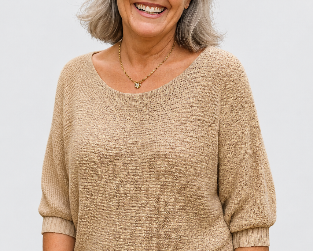 Anetta | Soft Knit Top - Flattering Shape on a neutral light grey background