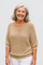 Anetta | Soft Knit Top - Flattering Shape on a neutral light grey background