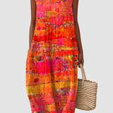 Arabella bright abstract print dress on a neutral grey background