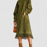 Juniper green fringe dress on a neutral grey background