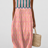 Blythe | Striped Pastel Midi Dress on a neutral light grey background