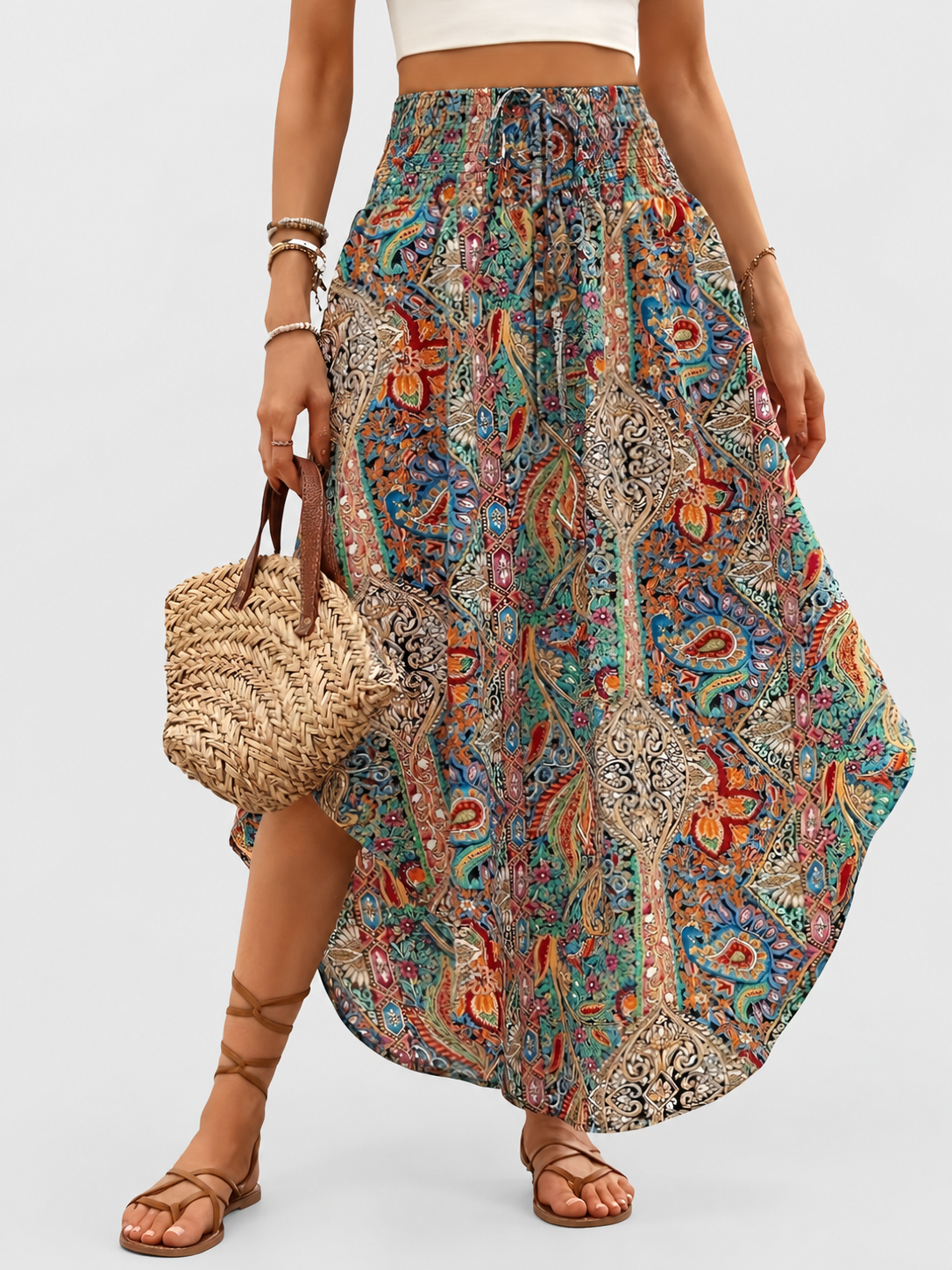 Boho High Waist Maxi Skirt with Paisley Print and Asymmetric Hem on a neutral light grey background