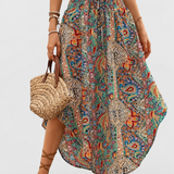 Boho High Waist Maxi Skirt with Paisley Print and Asymmetric Hem on a neutral light grey background