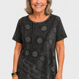 Calla grey patchwork top on a neutral grey background