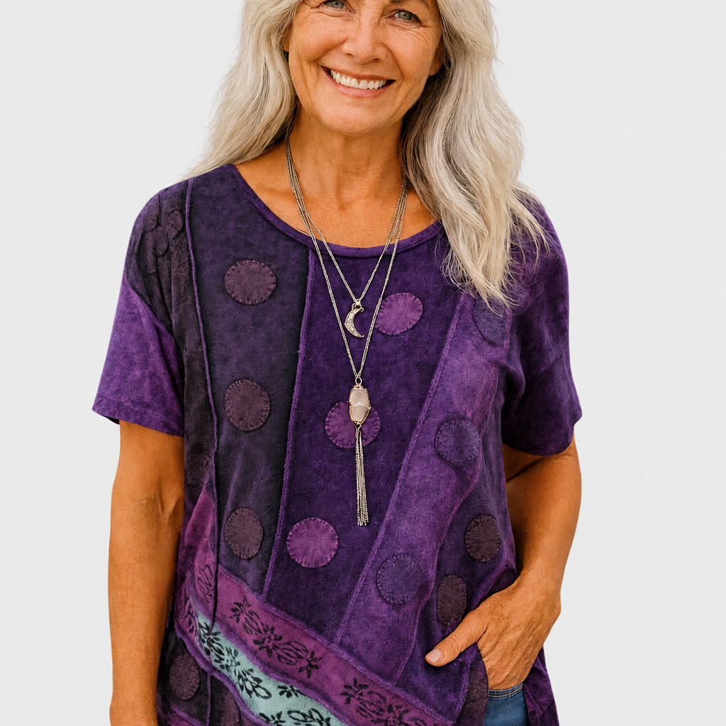 Calla purple patchwork top on a neutral grey background