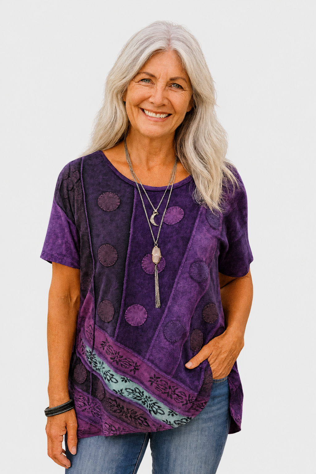 Calla purple patchwork top on a neutral grey background