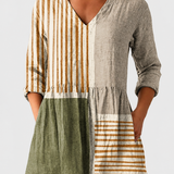 Camille | Neutral Stripe V-Neck Blouse on a neutral light grey background
