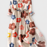 Cheryl | Retro Bloom Dress on a grey background