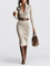 Clara | Belted Funnel-Neck Knitted Dress on a grey background