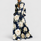Lanna | Floral Button Maxi Dress on a neutral light grey background