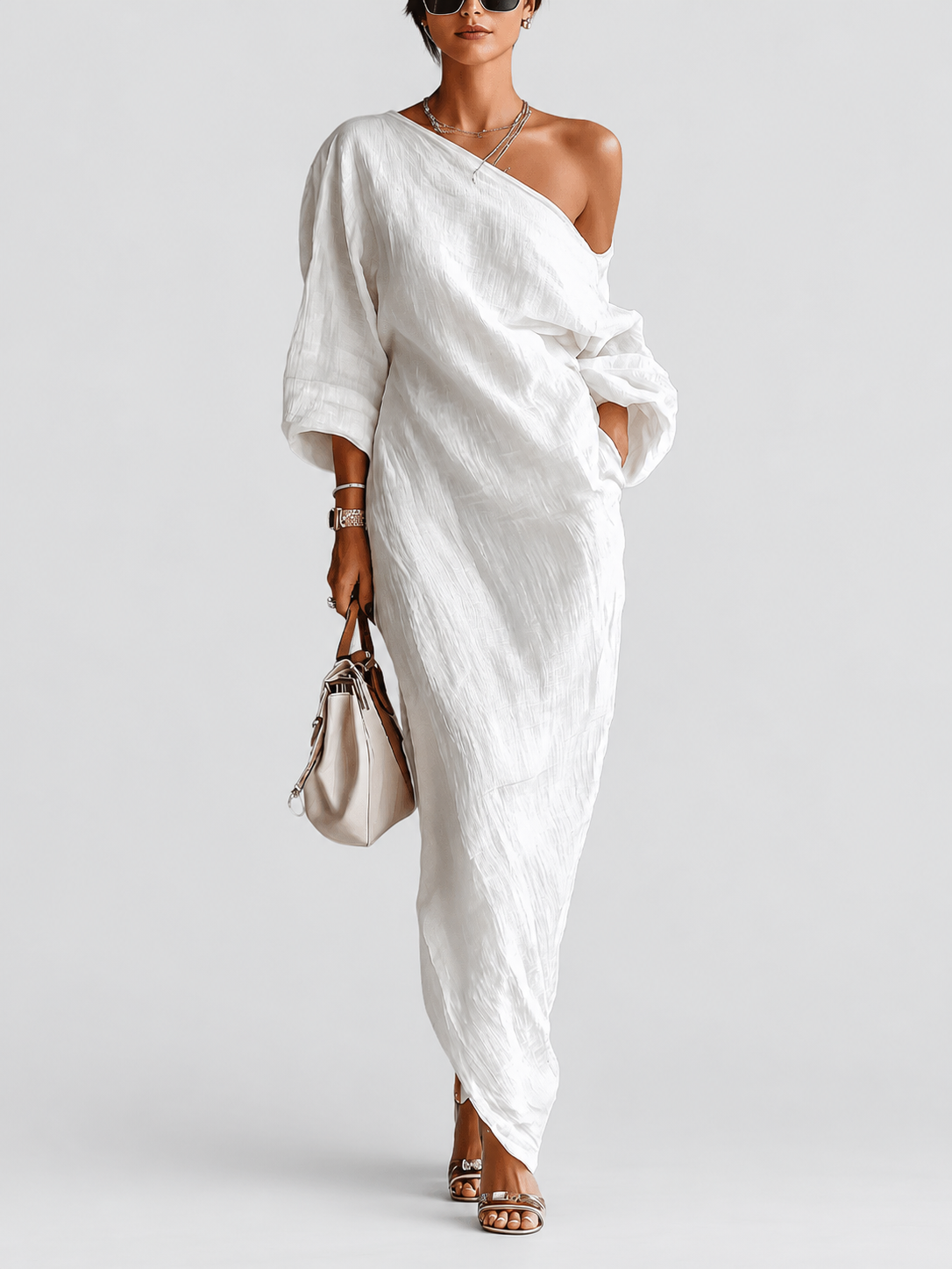 Aurora | Ivory One-Shoulder Flowing Maxi Dress — grey studio background