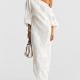 Aurora | Ivory One-Shoulder Flowing Maxi Dress — grey studio background
